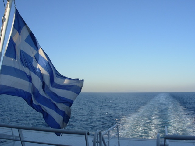 Greek flag flying from ferry stern